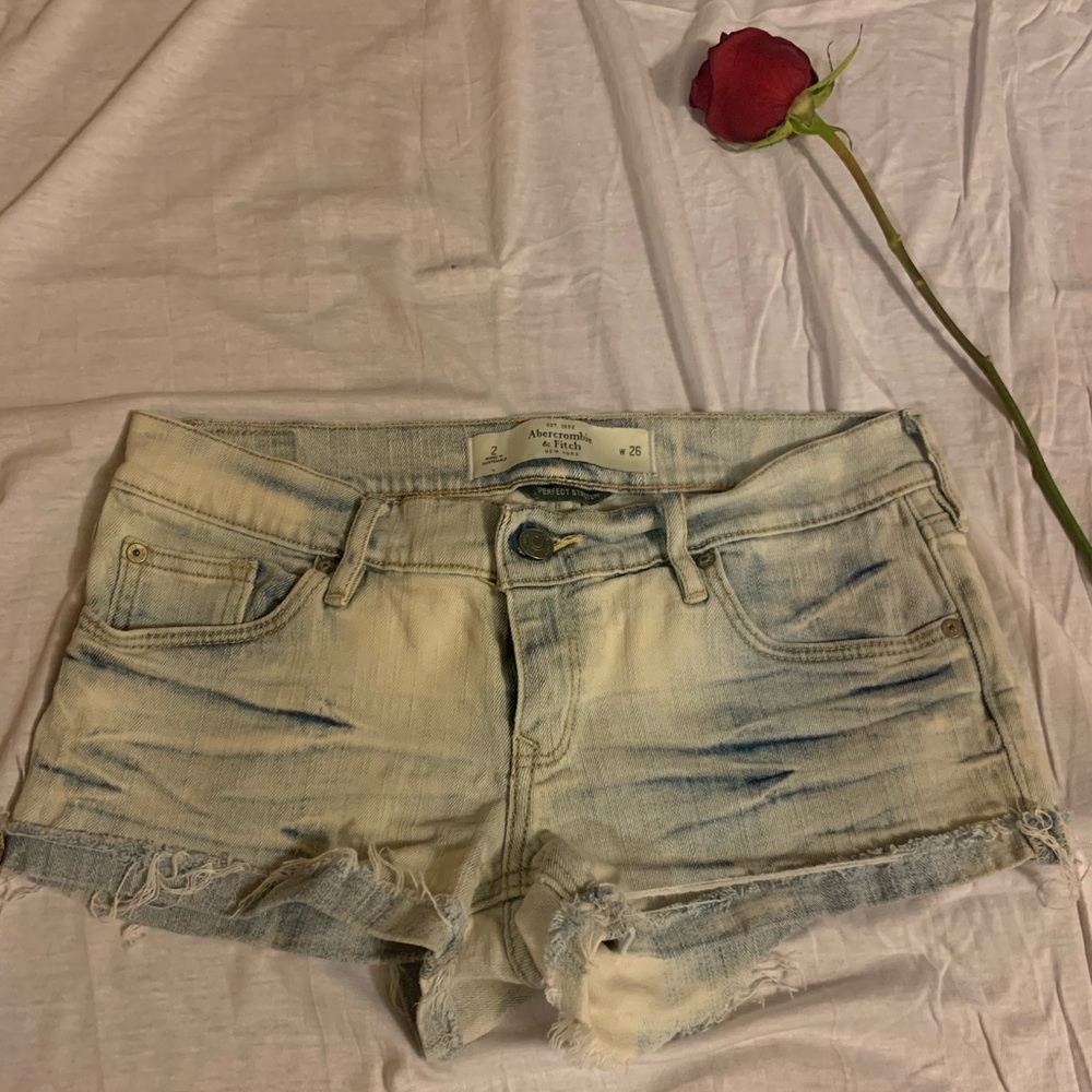 Abercrombie and Fitch destroyed denim shorts.